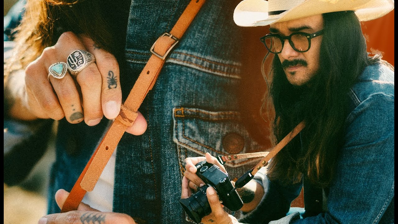 Идеальный кожаный ремешок для камеры для искателей приключений | The Roughout Rambler