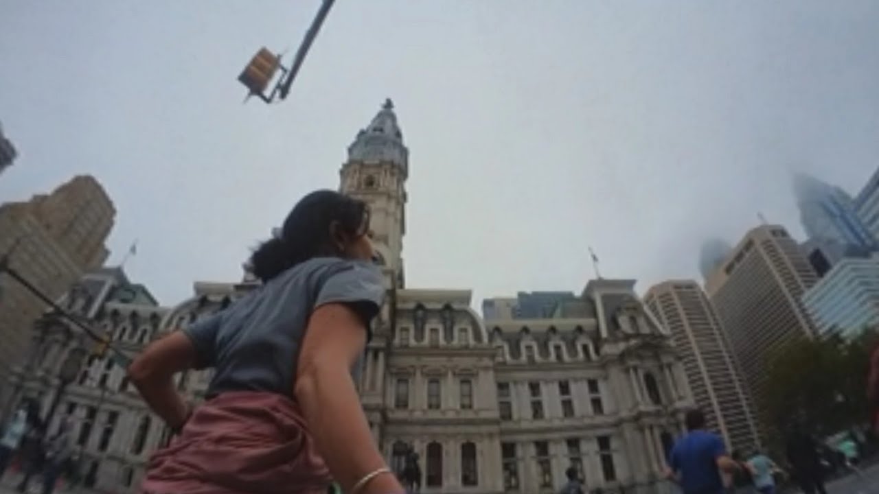 Broad Street Run Philadelphia 2021 holding an action camera | Largest ten miler in America