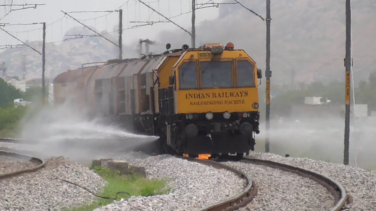 RAIL GRINDING MACHINE in ACTION | FIRE SPARKS and WATER Spraying | Indian Railways RGM
