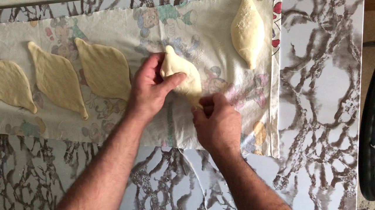 فديو تعليمي لطريقة فتح الصمون الحجري العراقي