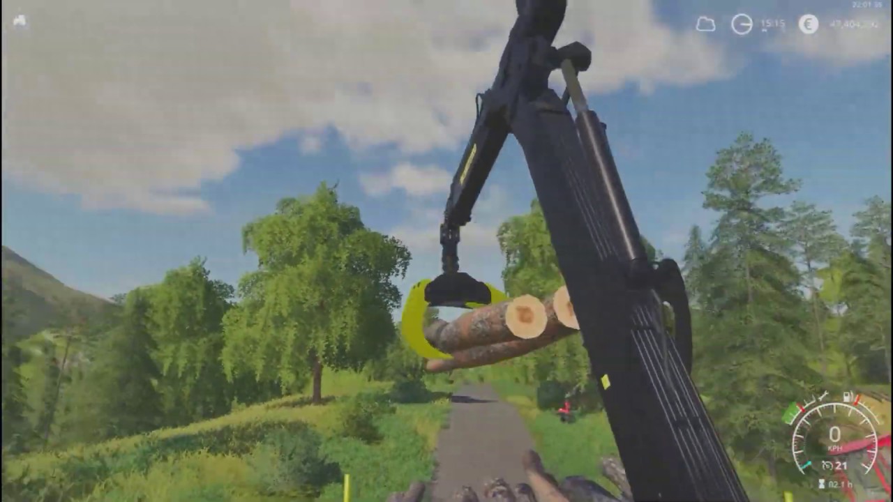 FS19 Loading some logs with JD 1910 ALS