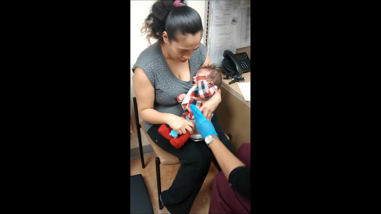 Baby Gabriel getting his first shots
