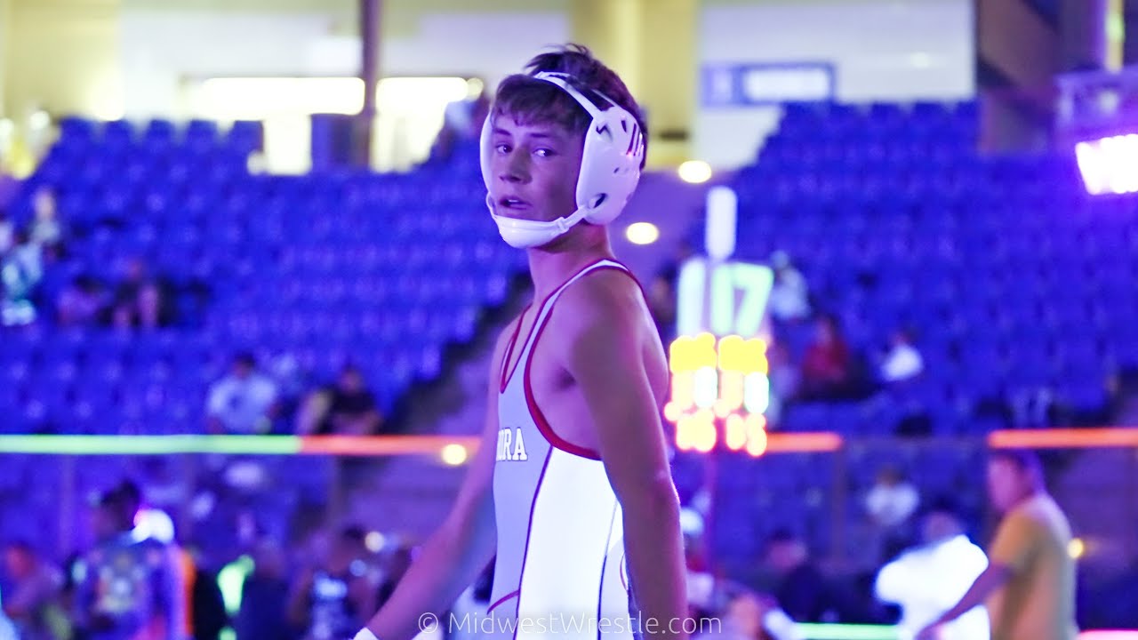 106 12U – Buck Rogers {G} of Katy Area Wrestling Club vs. {R} of Aurora Wrestling