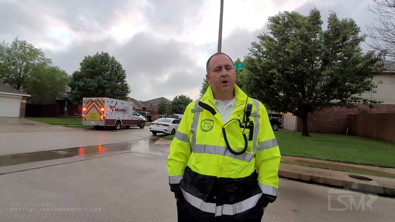 05-24-2021 Fort Worth, TX -Fort Worth FD rescues adult female from flooded road & creek.