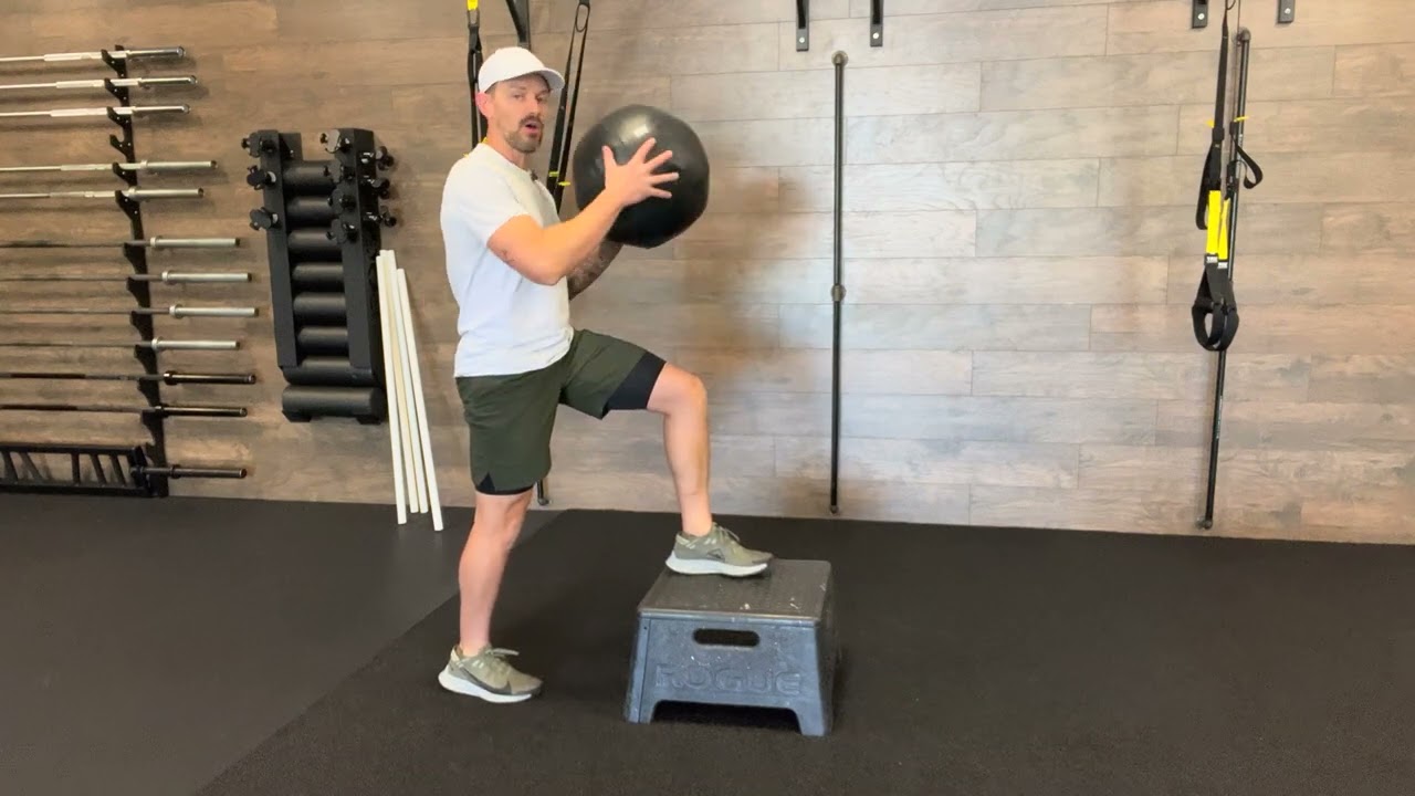 Medball Front Foot Elevated Contralateral Diagonal Chop