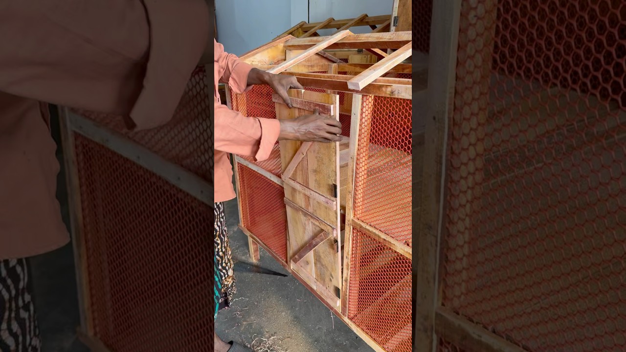 Installing the door to the two-story chicken coop #chickencoop #woodworking #pet