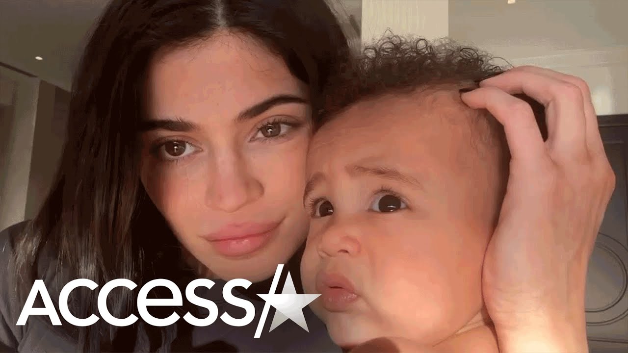 Kylie Jenner Kisses & Sings To Baby Aire In New Videos