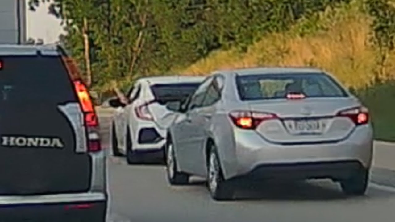 Road Rage. Driver blocks cars from passing after an accident. #roadrage #traffic  #accident