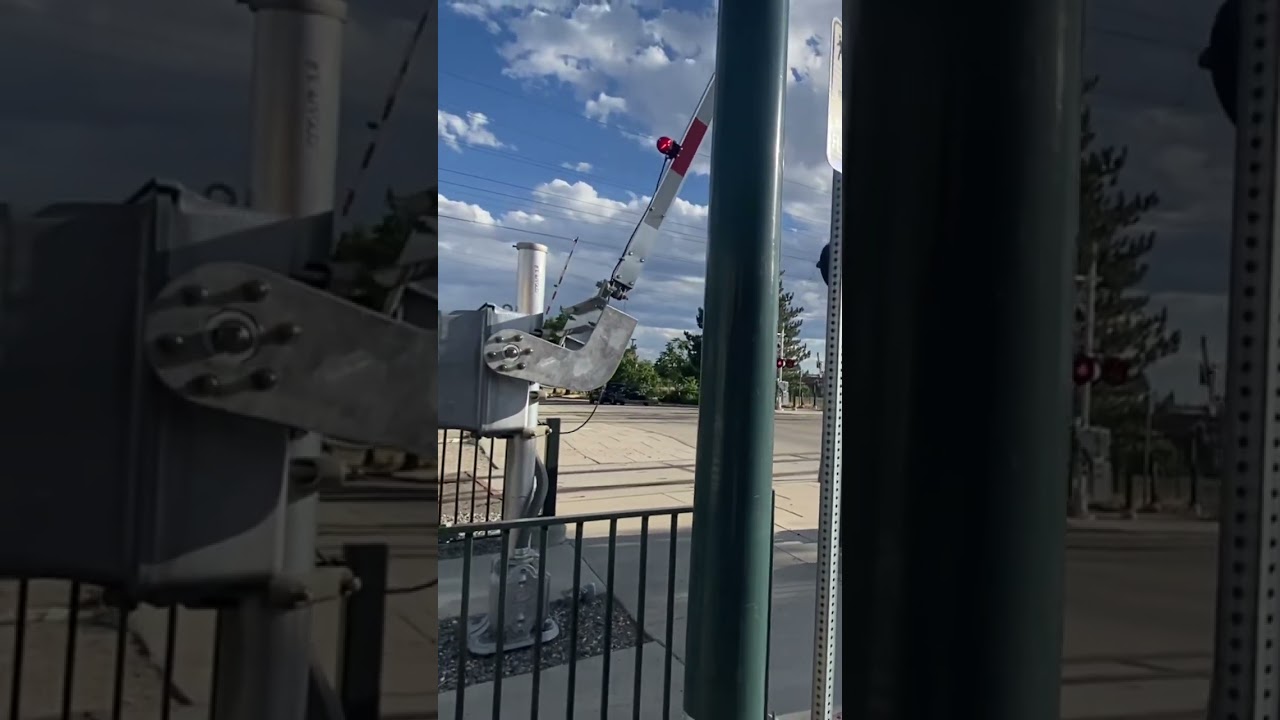 Broken rtd railroad crossing pedestrian gate