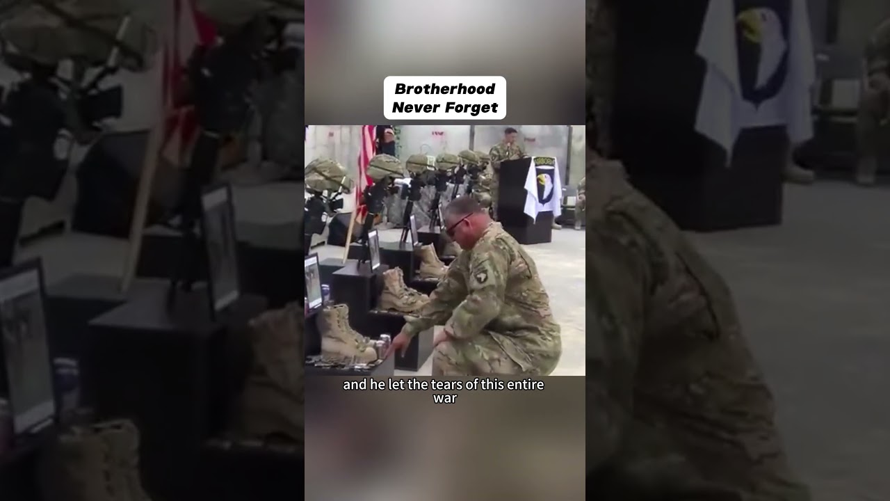 U.S. Sergeant Major overcome, kneels weeping at memorial for fallen comrades
