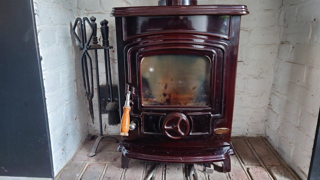 SWEEPING A STANLEY OISIN 6.5KW CAST IRON WOOD BURNING STOVE.