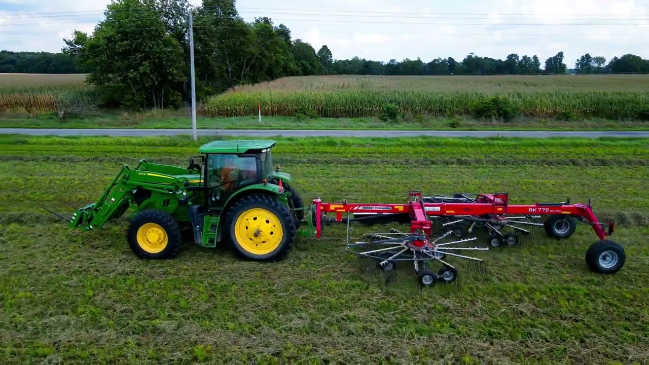 Cross-Road Farms Using A Massey RK772 To Rake Hay