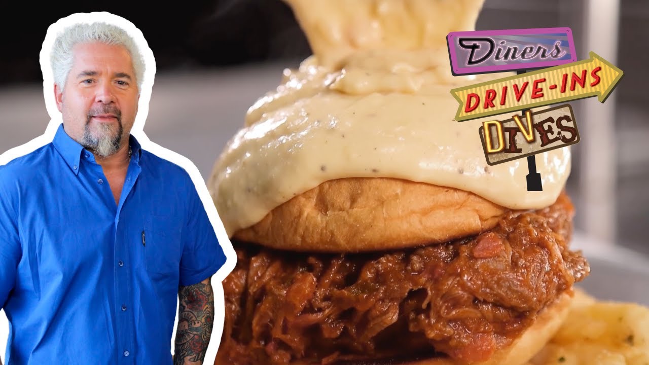 Guy Fieri Digs Into Beer Cheese SMOTHERED Sloppy Joe | Diners, Drive-Ins and Dives | Food Network