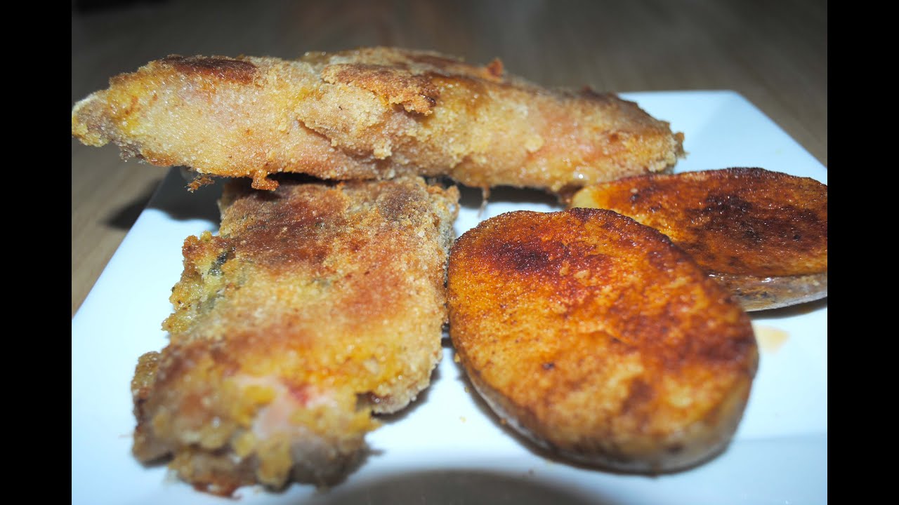 Peus de porc i patates al forn