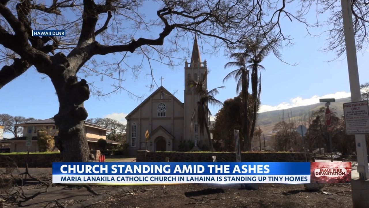 Maria Lanakila Catholic Church in Lahaina standing amid the ashes