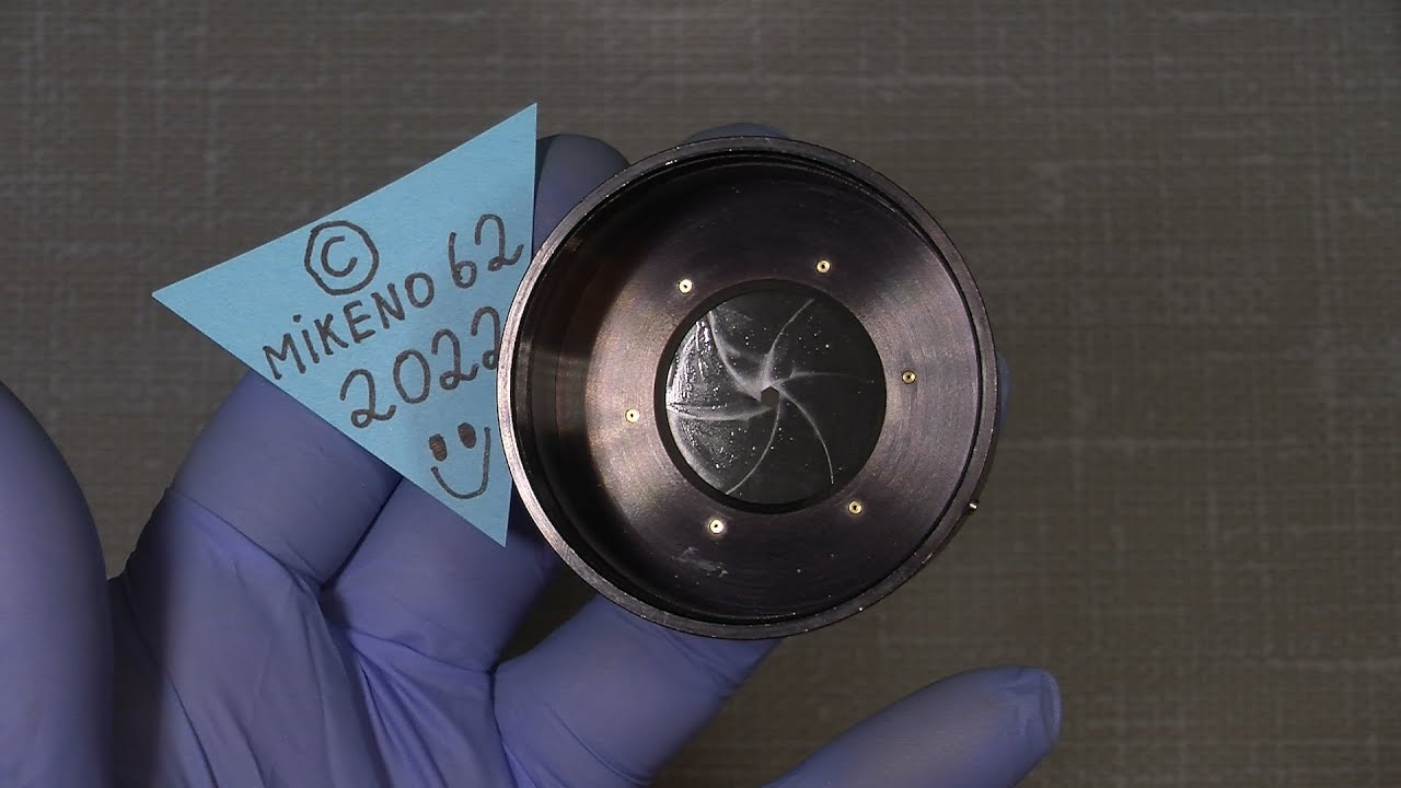 How to NOT cleaning the oily aperture assembly in a lens