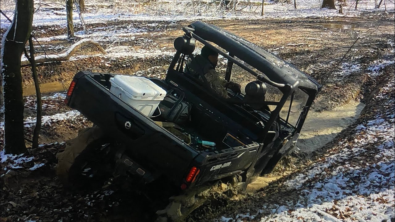 Can Am Defender going deep in the mud holes lets go!
