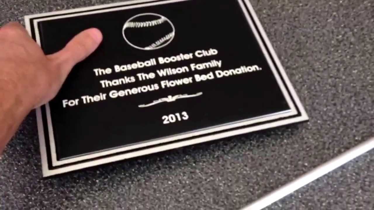 Review of silver and black cast aluminum plaque with stake