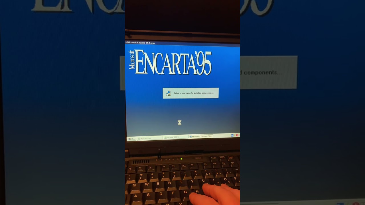 IBM ThinkPad 380ED (1997) running Windows 95 installing Microsoft Encarta 95