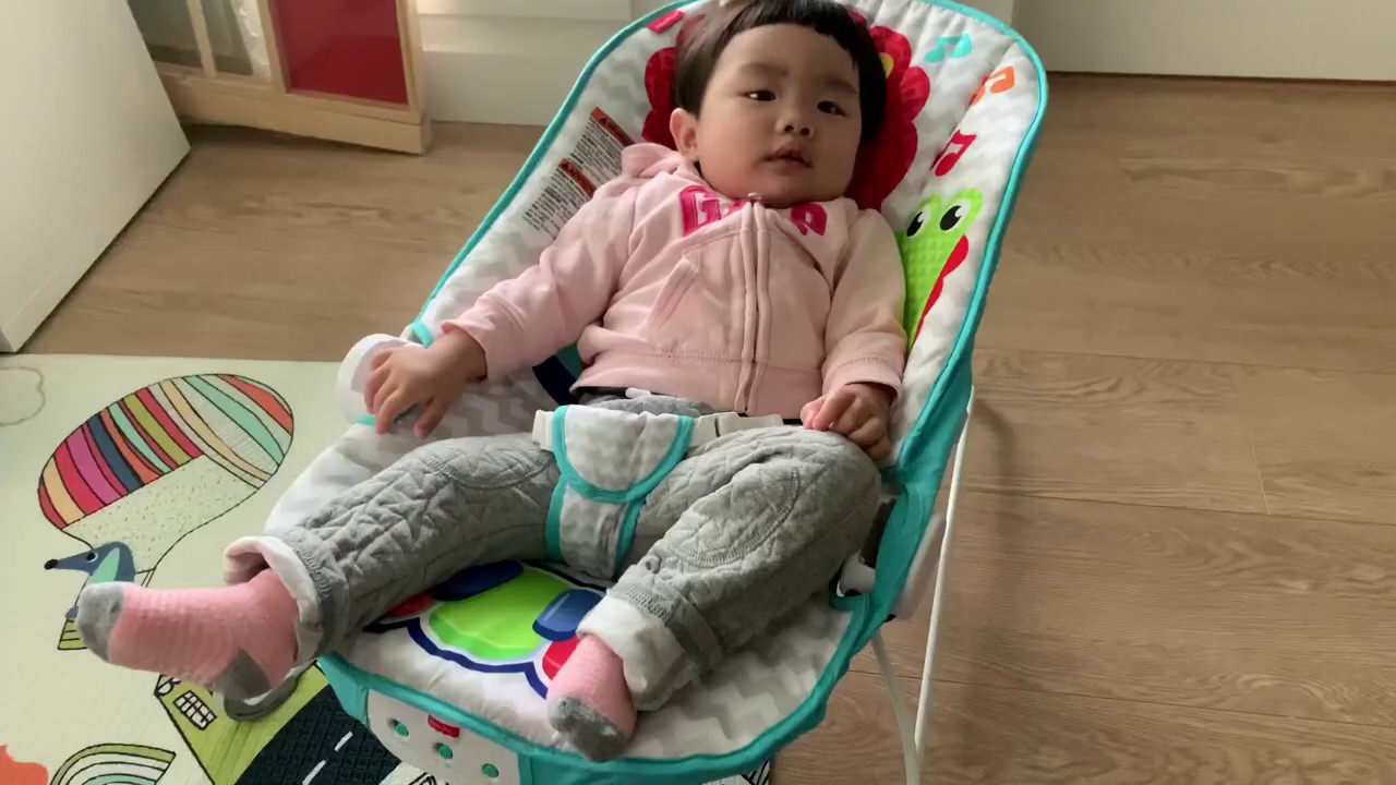 Laylay Sitting on the bouncer, burping, yawning, and taking off socks, Baby Routine ,12m1d