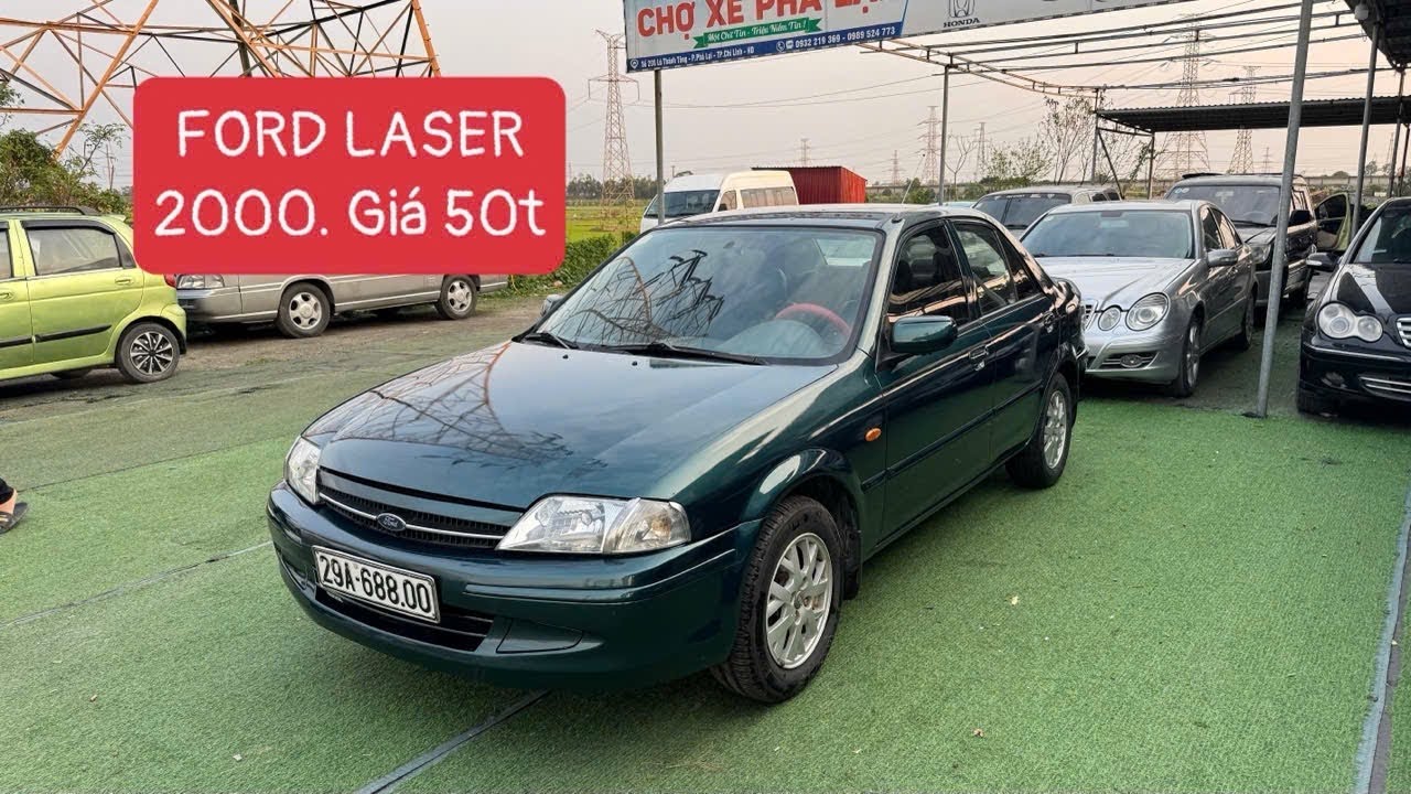 FORD LASER 2000. Dọn dẹp kỹ lưỡng em nó rồi các bác nhé, bóng mượt, khám phí mới 