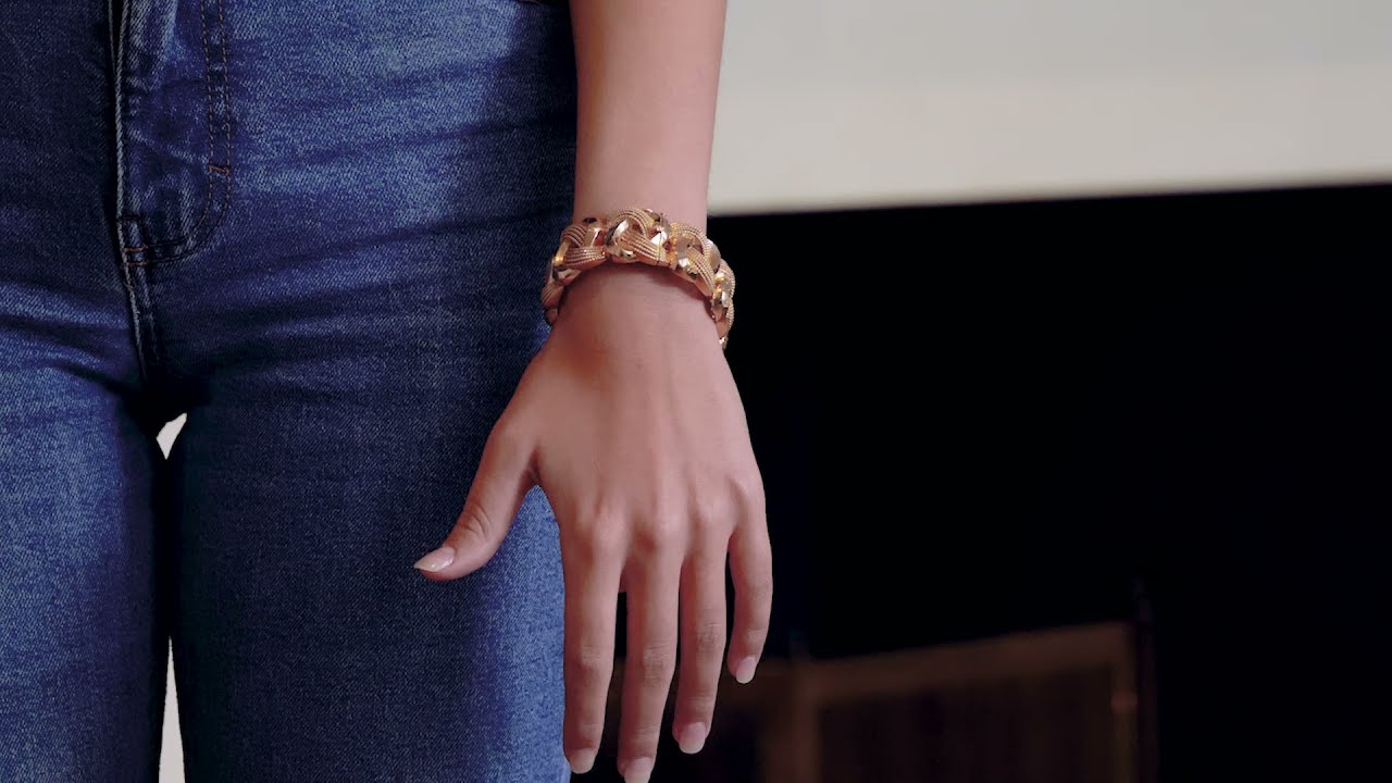 Bracelet vintage en or rose torsad&eacute;