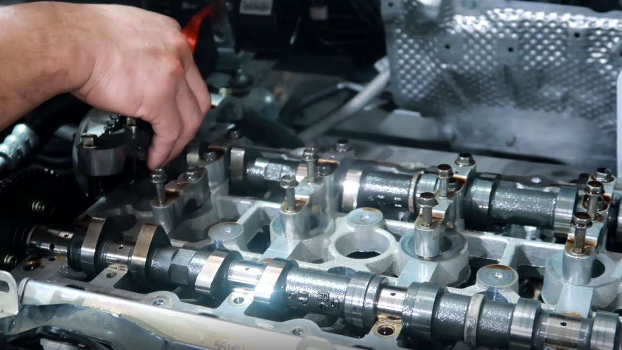 Как снять распредвалы Mitsubishi Lancer или Evo X
