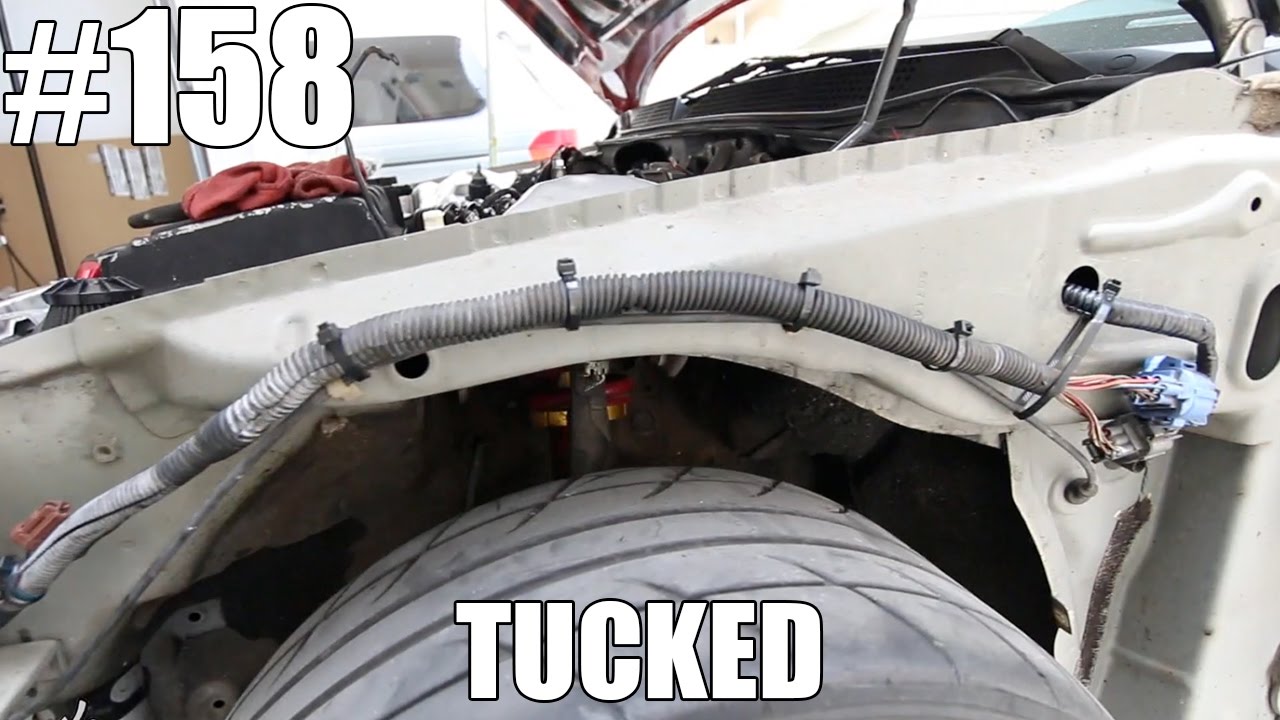 HEADLIGHT HARNESS TUCK