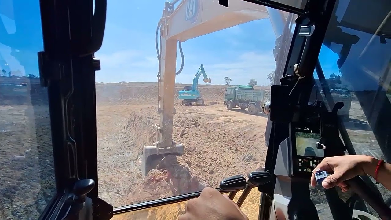 Take a look inside the cat 323 gc excavator New Logo
