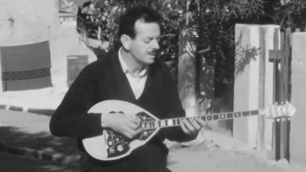 Συννεφιασμένη Κυριακή - Βασίλης Τσιτσάνης