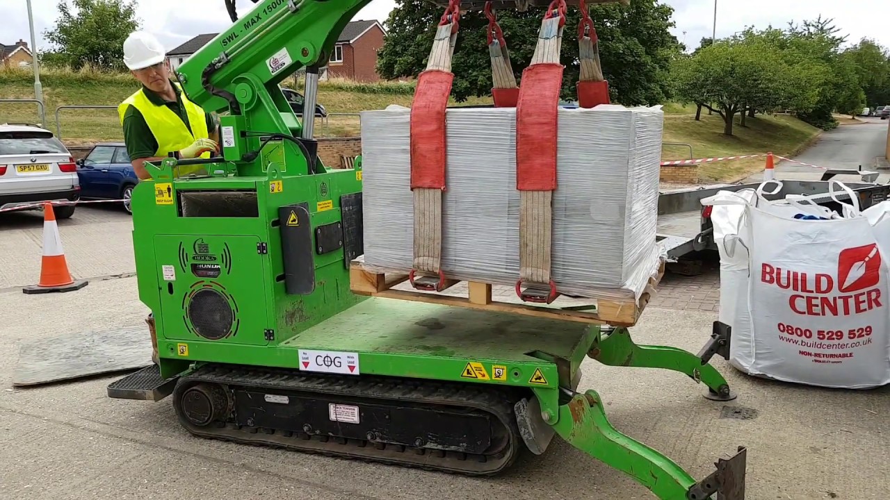 The Hooka Pick and Carry Crawler Handler Safely Lift Heavy Pallet of Bricks / Blocks