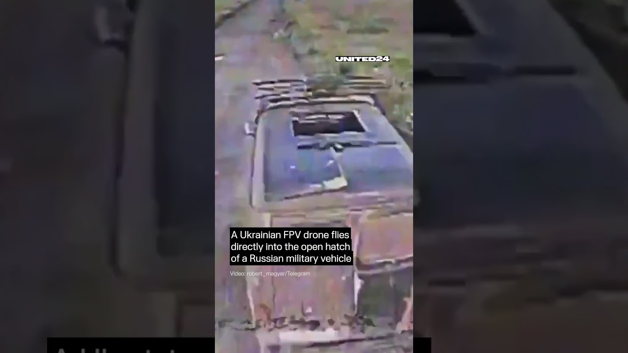 Ukrainian Drone Flies Directly Into Open Hatch of Russian Military Vehicle #warinukraine