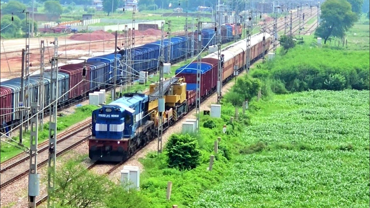 Jhansi Alco with Accident Relief Train crossing Sabarmati Muzaffarpur Jan Sadharan Express !!