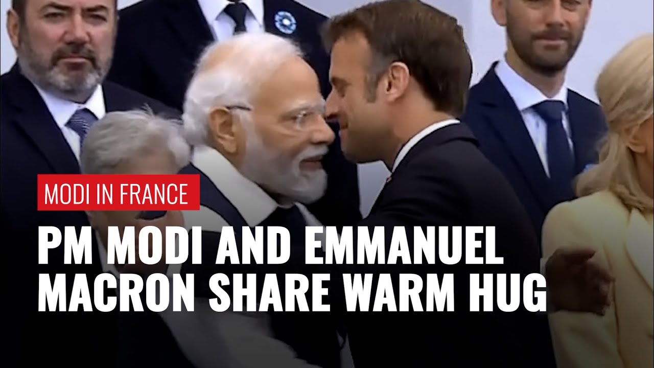 PM Modi and President Macron share a warm hug during Bastille Day Parade