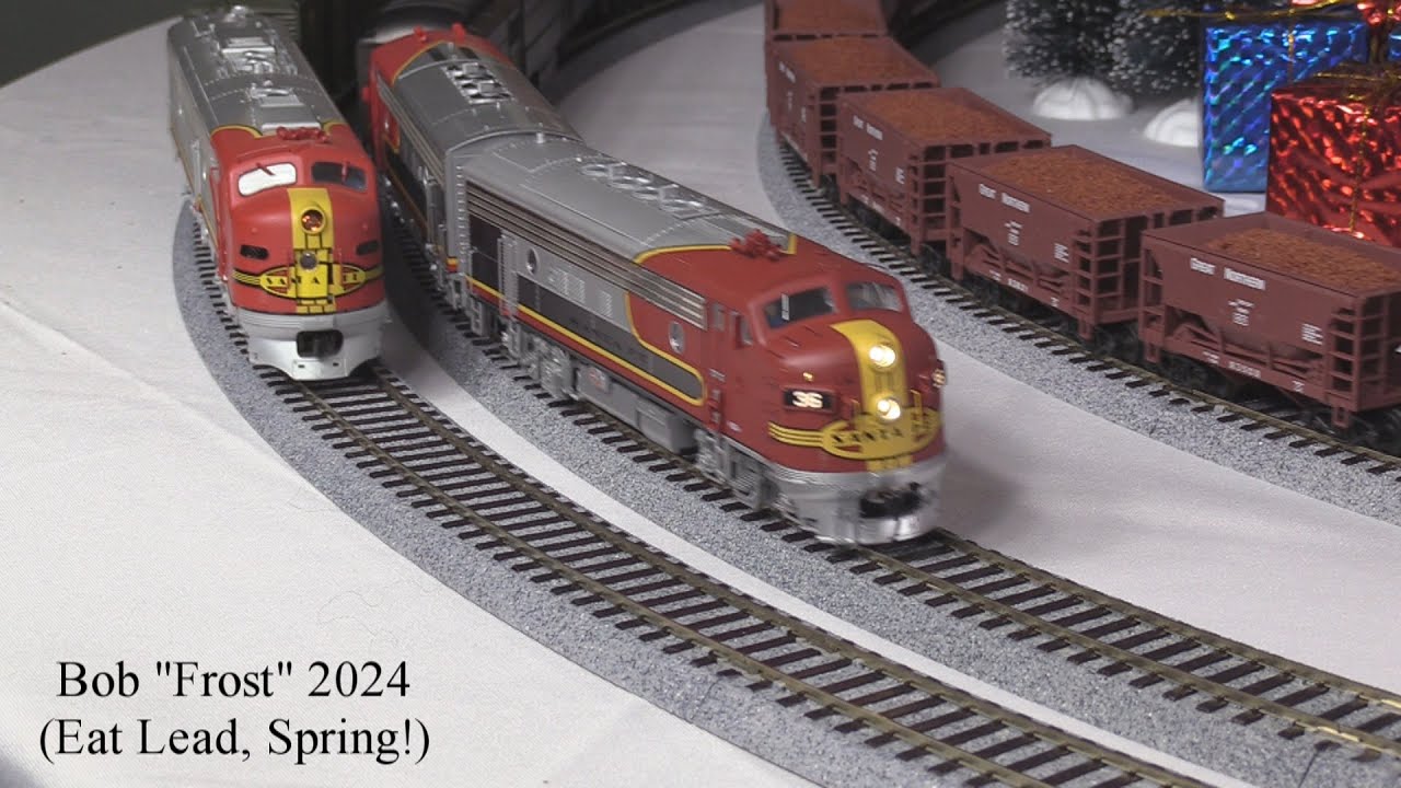 H-O Santa Fe E8 and F3s going Around the MST3K/Jack Frost Tree