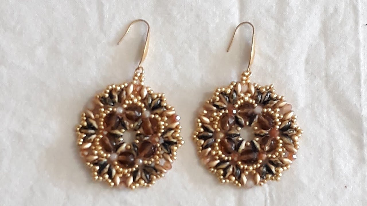 Aretes hechos a manos con superduo #byhaidee