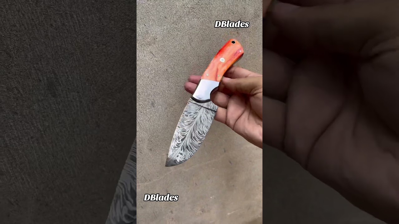 Handforged feather Damascus steel knife. 