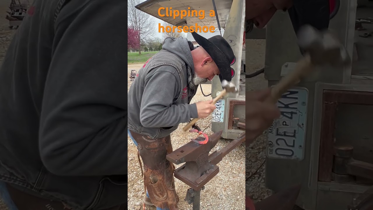 Making clips on a horseshoe. 