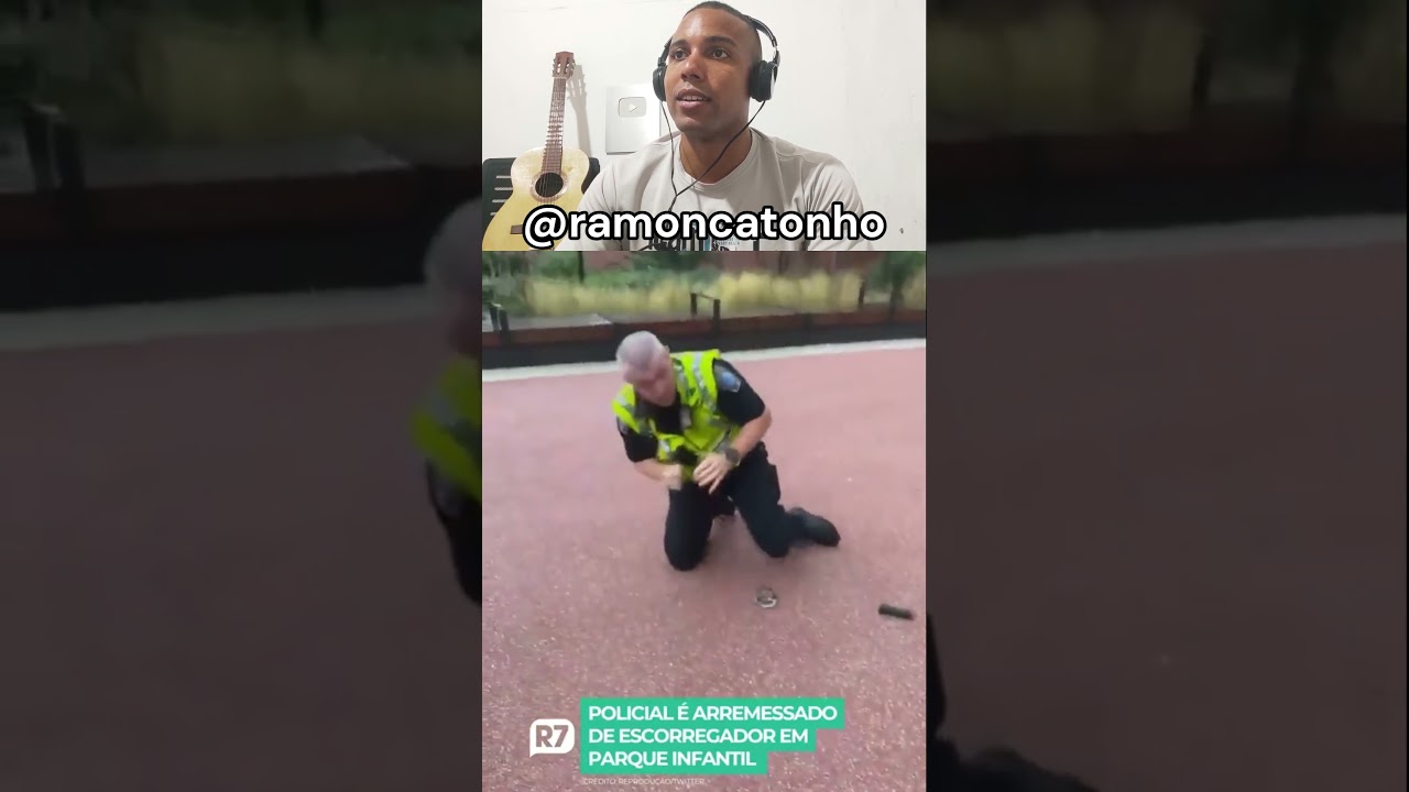 Policial brincando no escorrega   
