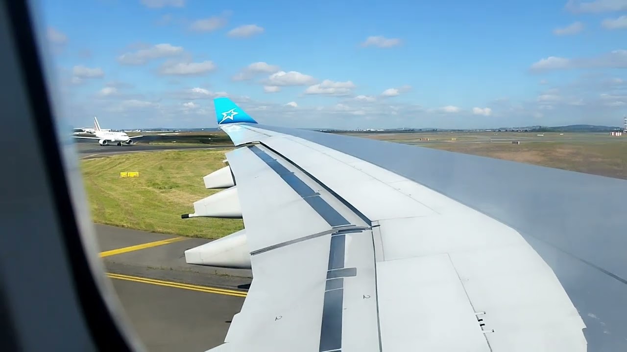 Décollage vue hublot d'un A330 depuis Paris Charles de Gaulle.
