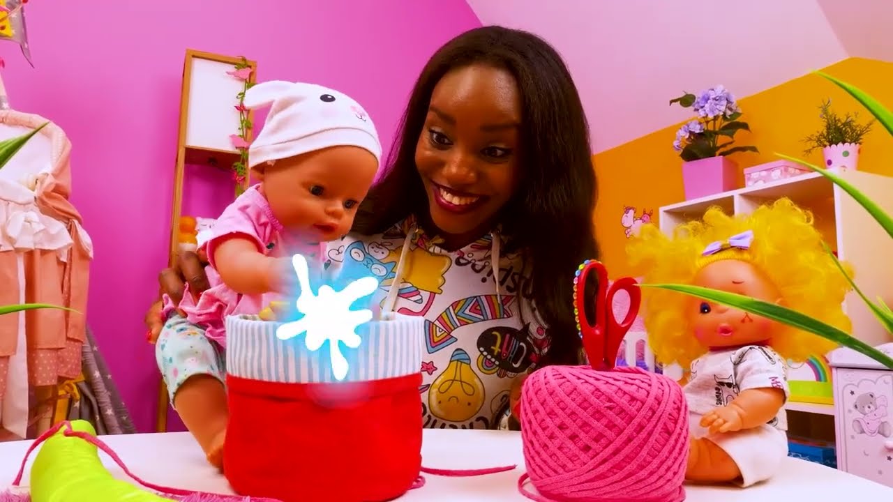 Baby Annabell doll needs a new crib mobile. Nanny calms down crying baby born dolls.