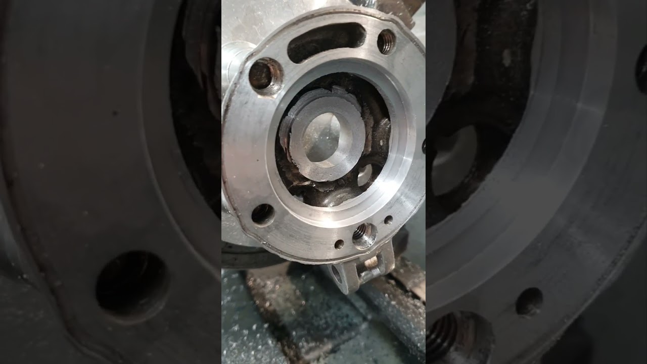 Two Stroke race engine cylinder head conversion to removable combustion chamber inserts