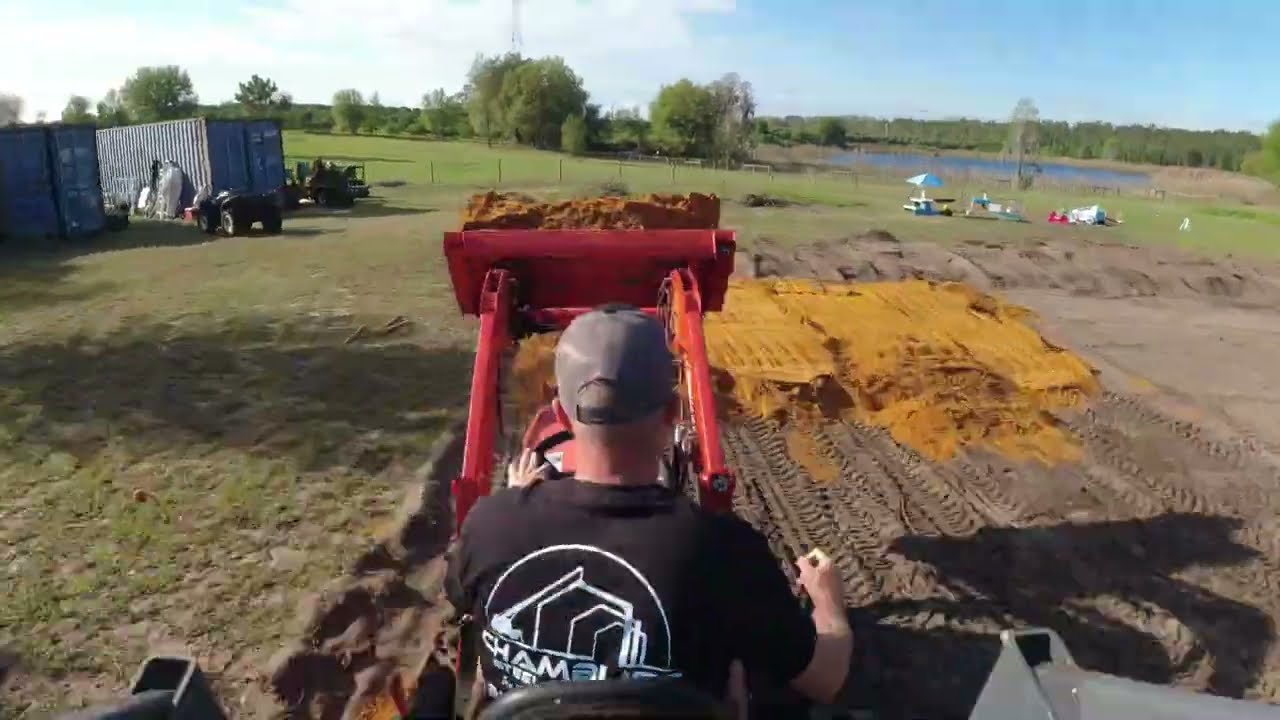 Little Kubota B2601 Subcompact Tractor DIY raising foundation grade for our Barndominium