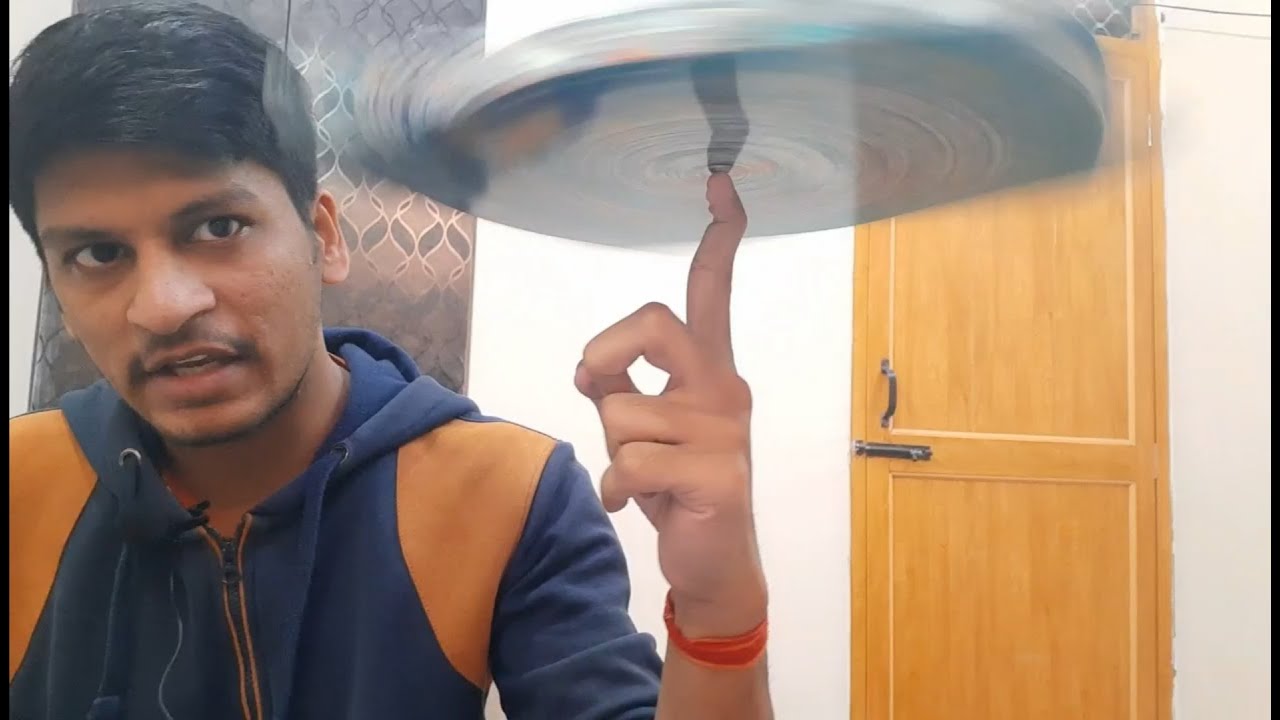 How to Spin a book on finger | Step by Step Tutorial