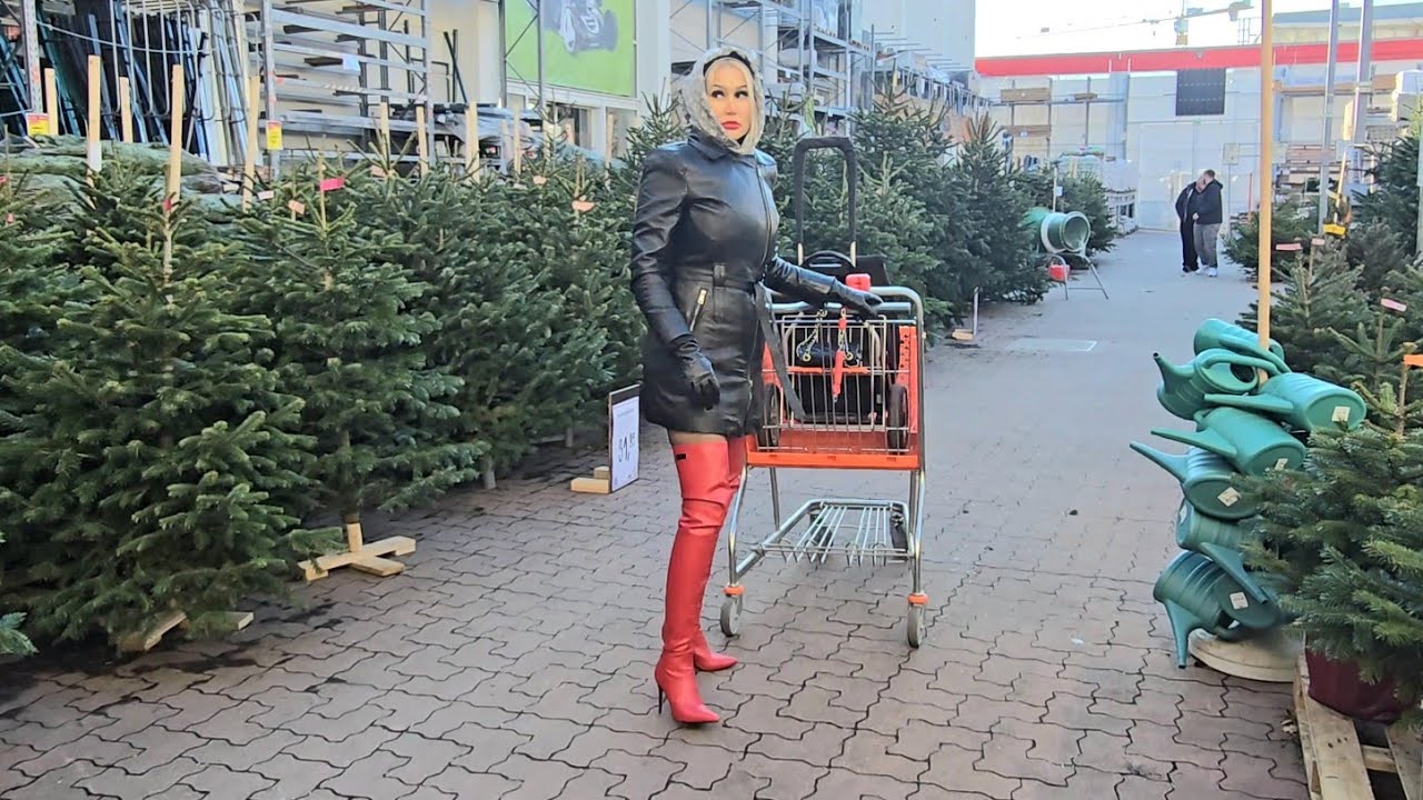 4k, Granate Travelling walking in public, buying christmas tree, short coat, red thigh high boots  