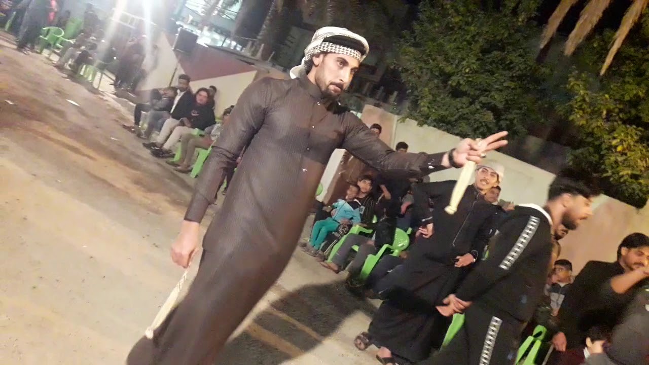 جوبي علي العامري وعلاء الأنباري مع الفنان حامد الفراتي في العامريه