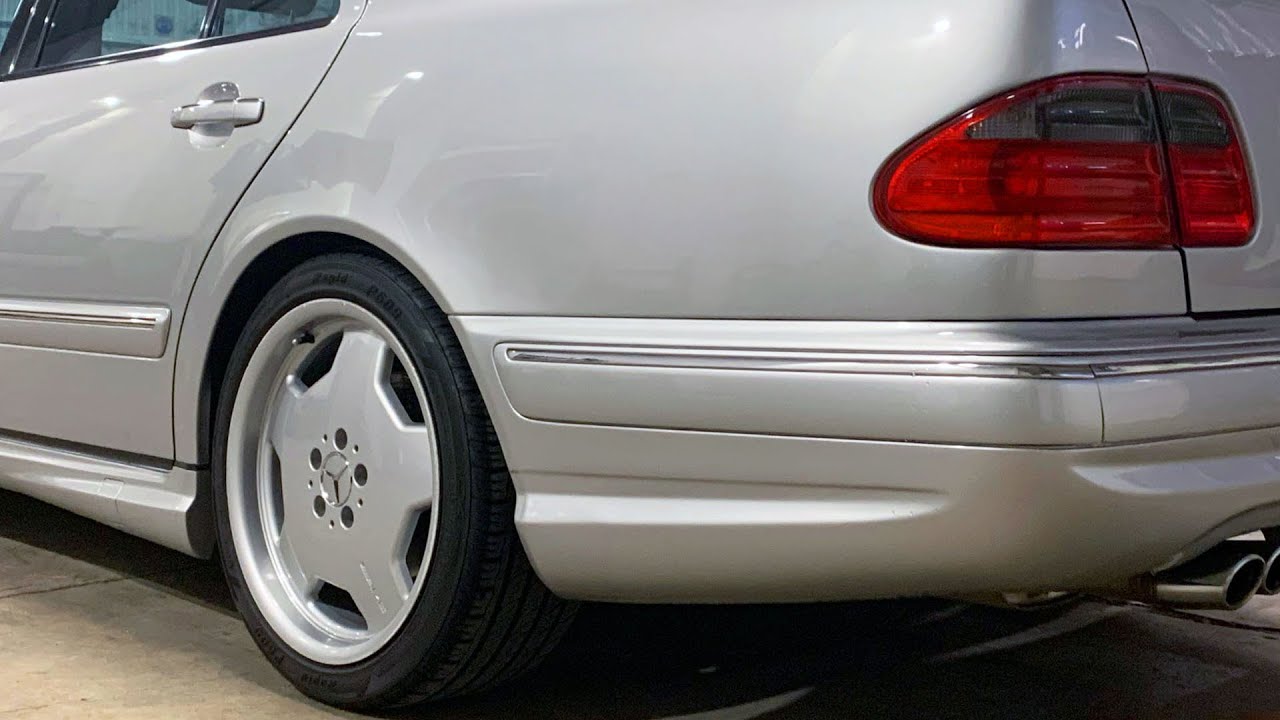 2000 Mercedes Benz E 55 AMG W210 supercar in the skin of a sedan
