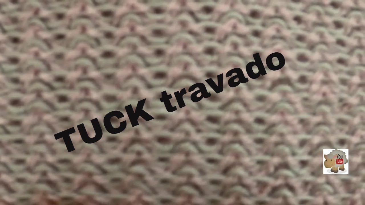 ponto TUCK travado em máquina de tricô