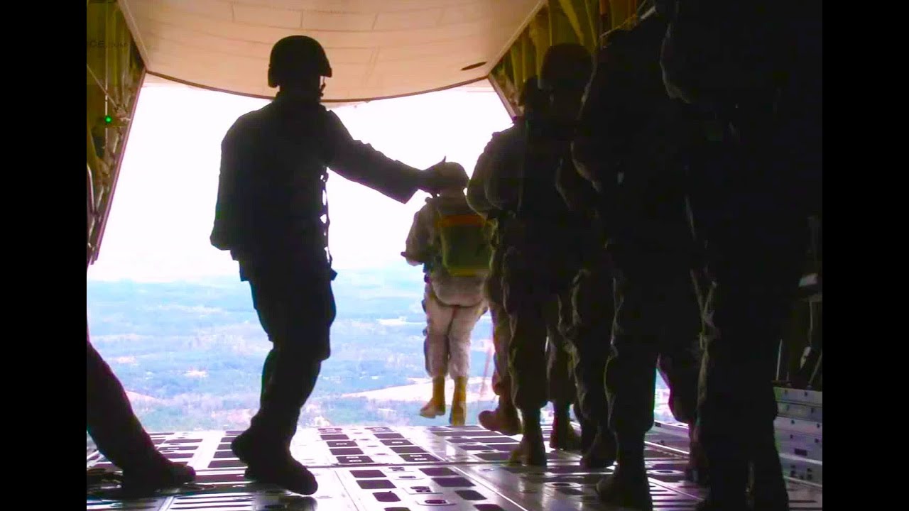 Marines, Supplies Parachute Out of C-130 Hercules
