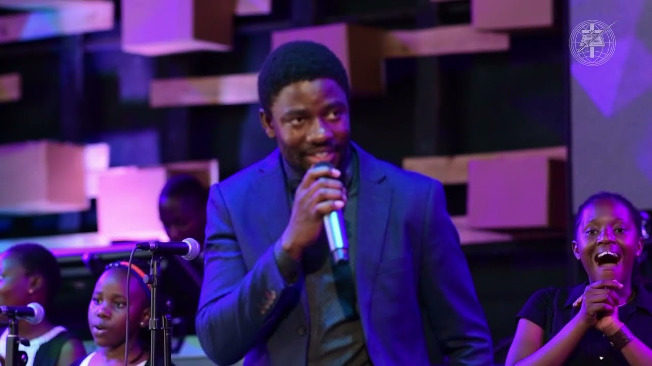 Praise & Worship led by Solomon Nkwanga and Brian Njuba with the Mass Choir.